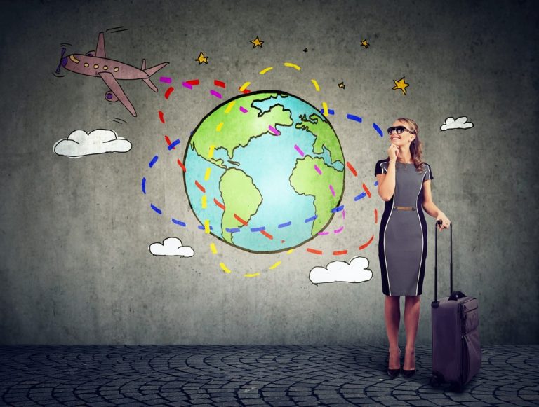 woman with suitcase ready to travel by plane around the world